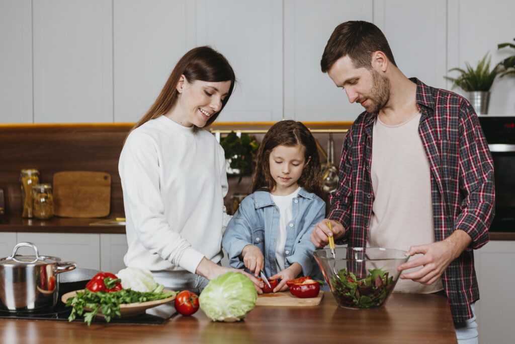 front view family preparing food kitchen home